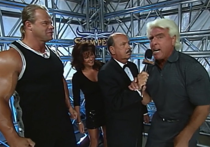 wcw-spring-stampede-2000-team-package Mean Gene Okerlund interviews Team Package (Ric Flair, Lex Luger, and Elizabeth) at WCW Spring Stampede 2000