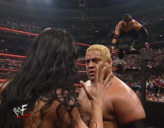 Chyna distracts Rikishi from an Eddie Guerrero attack at Unforgiven 2000