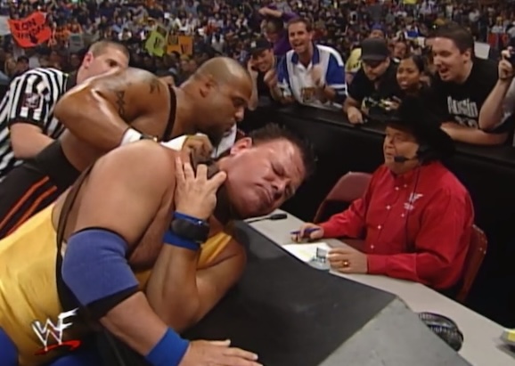 Tazz chokes Jerry Lawler at WWF Unforgiven 2000