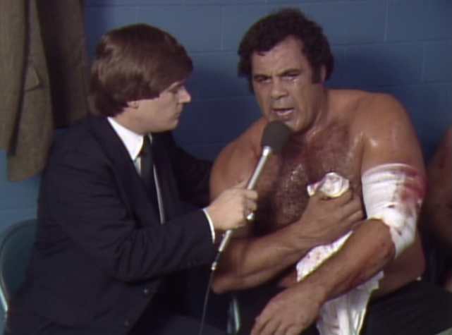 Tony Schiavone interviews a hurt Angelo Mosca at NWA Starrcade 1983