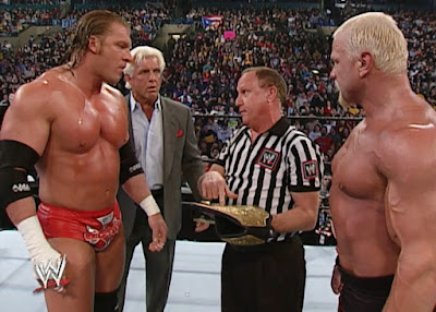 Earl Hebner addresses Scott Steiner and Triple H (w/ Ric Flair) at the Royal Rumble 2003