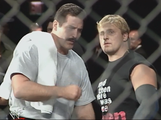 WWE / WWF Summerslam 1998 - Dan Severn gives Owen Hart some encouragement before Hart's Lion's Den match with Ken Shamrock