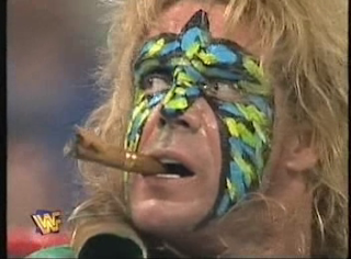 WWF / WWE - IN YOUR HOUSE 7 - GOOD FRIENDS BETTER ENEMIES - Ultimate Warrior smokes Marlena's cigar in his 'match' against Goldust