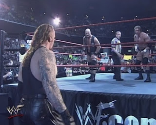 WWE / WWF Insurrextion (2001) - The Undertaker faced Steve Austin and Triple H in a handicap match