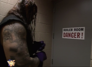 WWF / WWE SUMMERSLAM 1996 - The Undertaker enters the boiler room for his match with Mankind