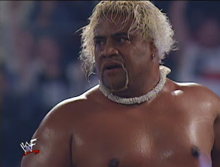 WWE / WWF - Fully Loaded 2000 -  Rikishi gets ready to jump off the top of the cage onto Val Venis