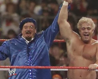 WWF / WWE: Wrestlemania 5 - Dino Bravo (with Frenchy Martin) celebrates his win over Rugged Ronnie Garvin