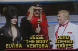 WWF / WWE WRESTLEMANIA 2 - The commentary team for the LA portion of the show included Jesse 'The Body' Ventura, Lord Alfred Hayes and TV star Elvira