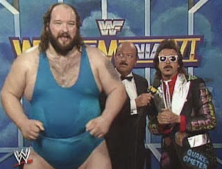 WWF / WWE: Wrestlemania 6 - Earthquake (w/ Jimmy Hart) speaks to Mean Gene Okerlund about his upcoming match against Hercules