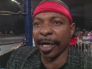 WCW Great American Bash 1990 - Teddy Long led Doom into battle against the Rock 