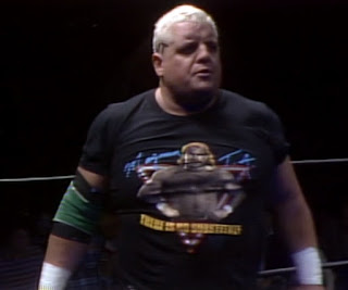 NWA Starrcade 1986 (The Skywalkers) - Dusty Rhodes wearing a Magnum TA t-shirt