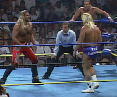 WCW WrestleWar 92  - Bill Alfonso stands ready as Michael Hayes squares off agaisnt Greg Valentine