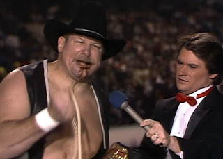 WCW Starrcade '90 Review  - Tony Schiavone looks disgusted as he interviews US Champion Stan Hansen