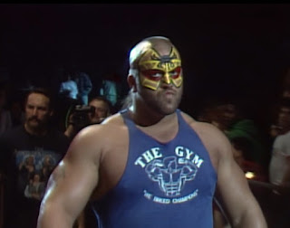 NWA Bunkhouse Stampede 1988 Event Review - Paul Ellering leads Road Warrior Animal into battle in the Bunkhouse Stampede cage match battle royal