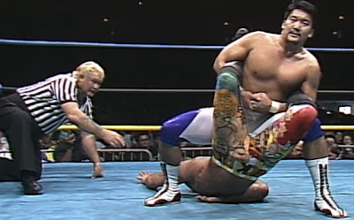 Halloween Havoc 1992 - Masa Chono puts Rick Rude in a submission hold