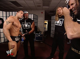 WWE / WWF No Way Out 2002 - The Rock poses for a photo with the New World Order