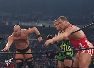 WWE / WWF Survivor Series 2001 - Steve Austin, RVD, and Kurt Angle reach for a tag