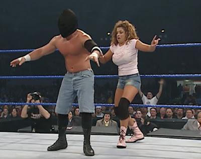 WWE No Way Out 2004 - Nidia goes after a blindfolded Jamie Noble WWE No Way Out 2004 - Nidia goes after a blindfolded Jamie Noble